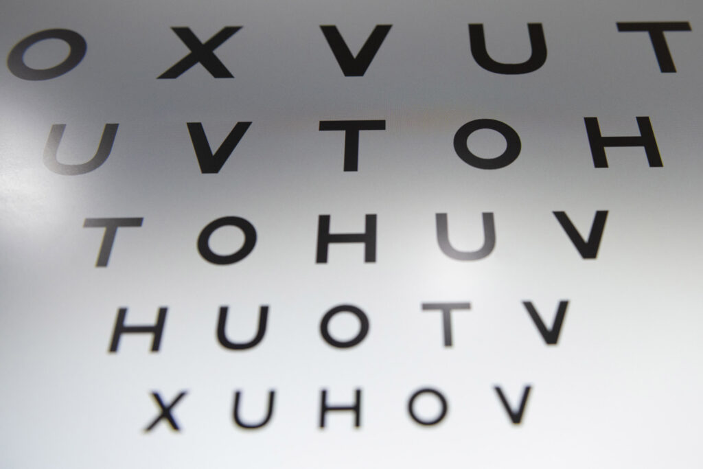 An eye chart with letters getting progressively smaller down the page